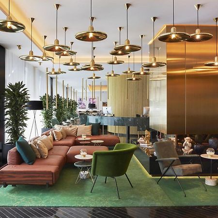 ホテル ルームス ミューニック オートグラフ コレクション ミュンヘン エクステリア 写真 The lobby of the hotel