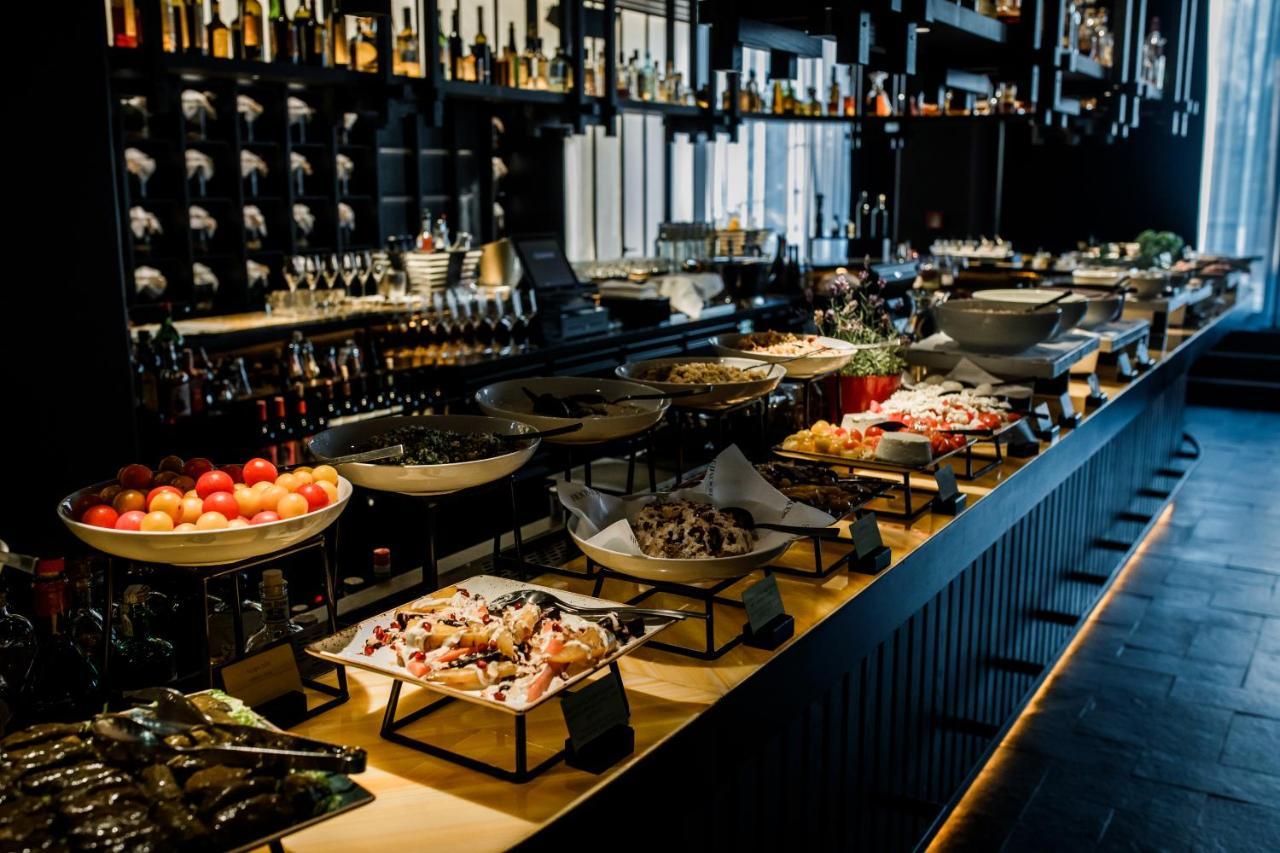 ホテル ルームス ミューニック オートグラフ コレクション ミュンヘン エクステリア 写真 The bar at the restaurant