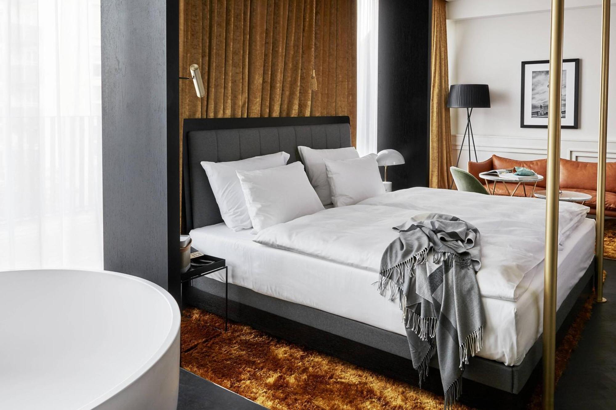 ホテル ルームス ミューニック オートグラフ コレクション ミュンヘン エクステリア 写真 A bedroom at the Hotel