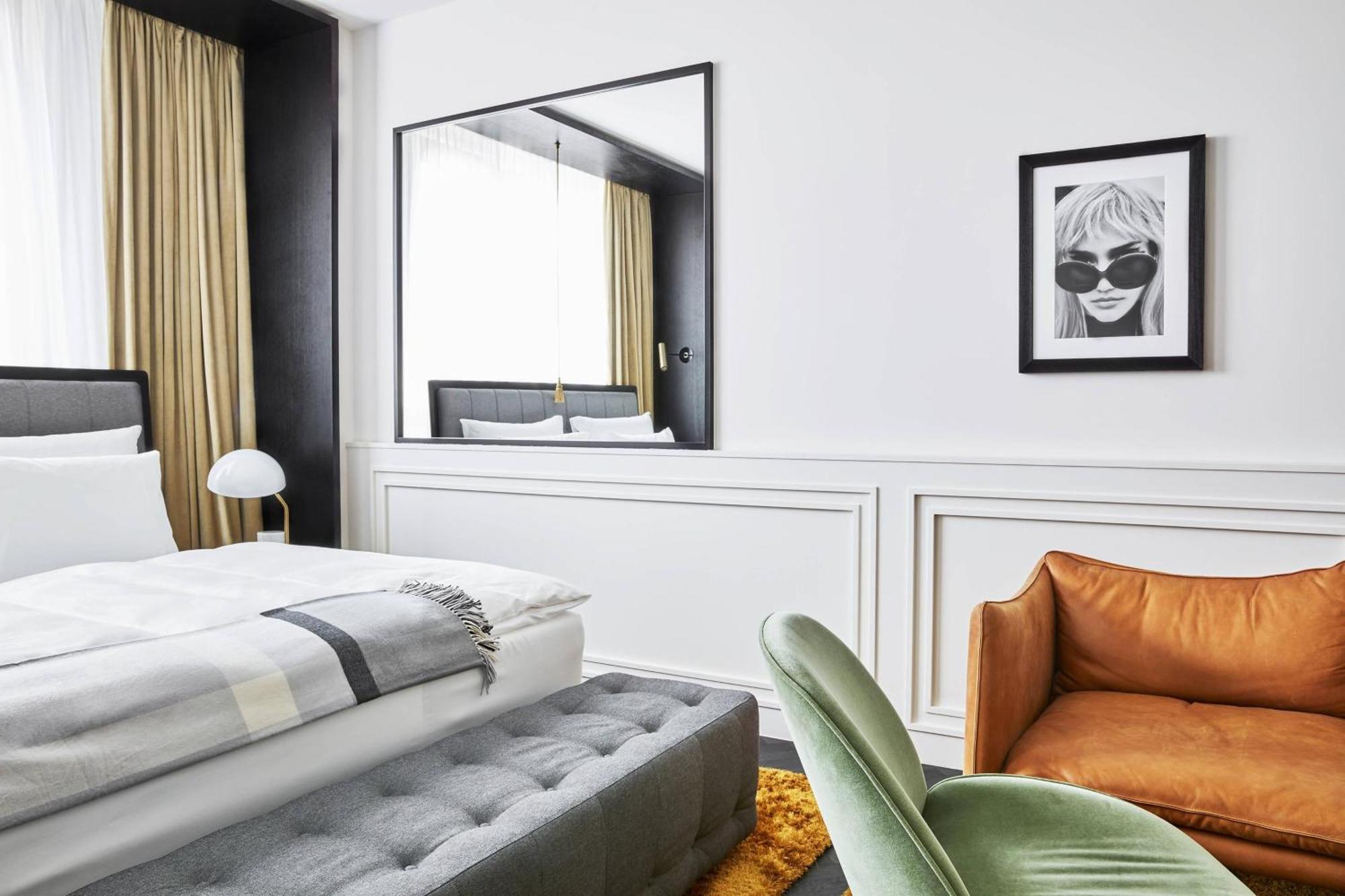 ホテル ルームス ミューニック オートグラフ コレクション ミュンヘン エクステリア 写真 A bedroom at the hotel